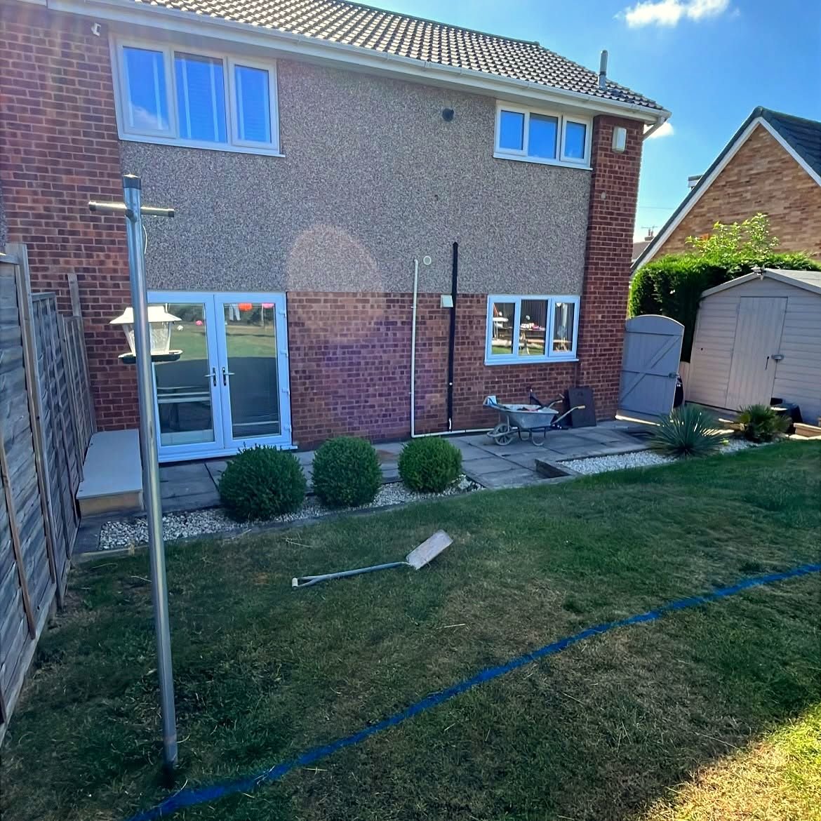 Garden before landscaping, patio area marked out