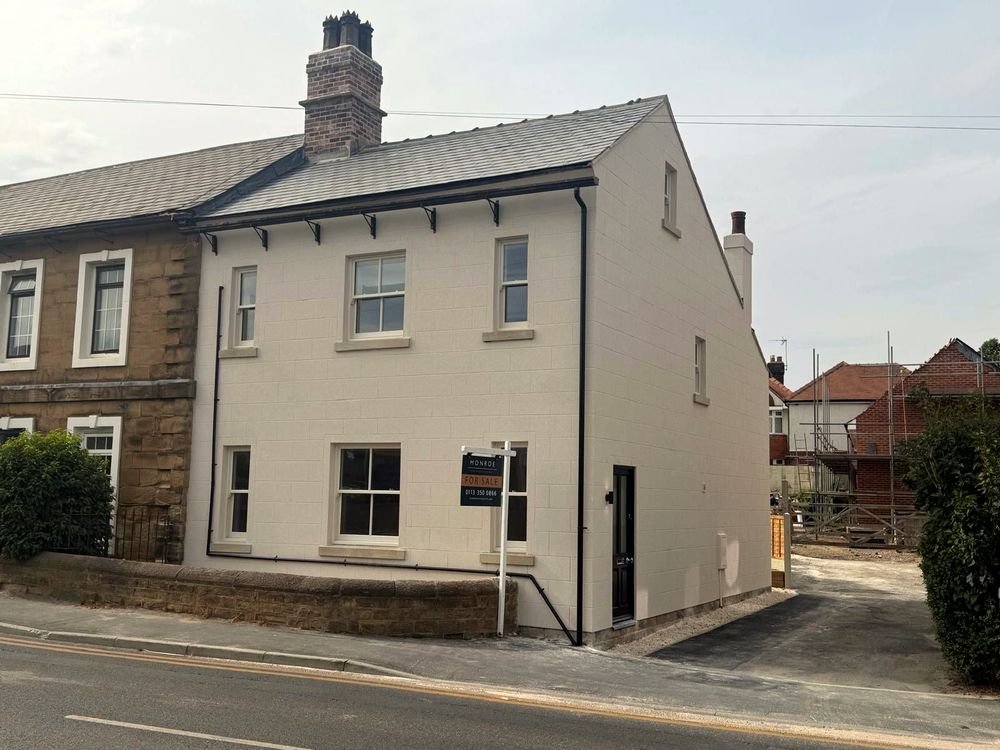 Fully rebuilt period property, finished with painted render and sash windows