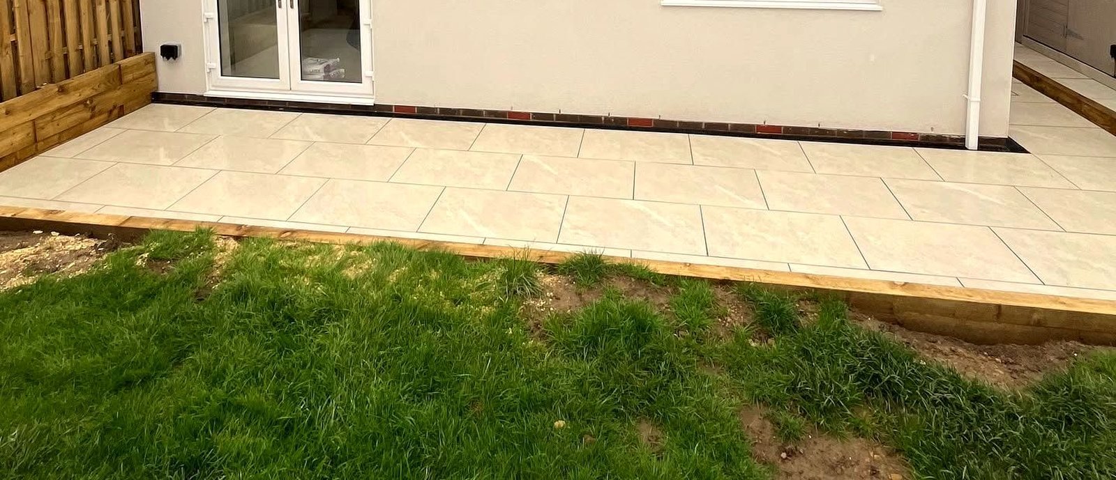 New porcelain patio, a recent NEPO Construction landscaping project in Leeds